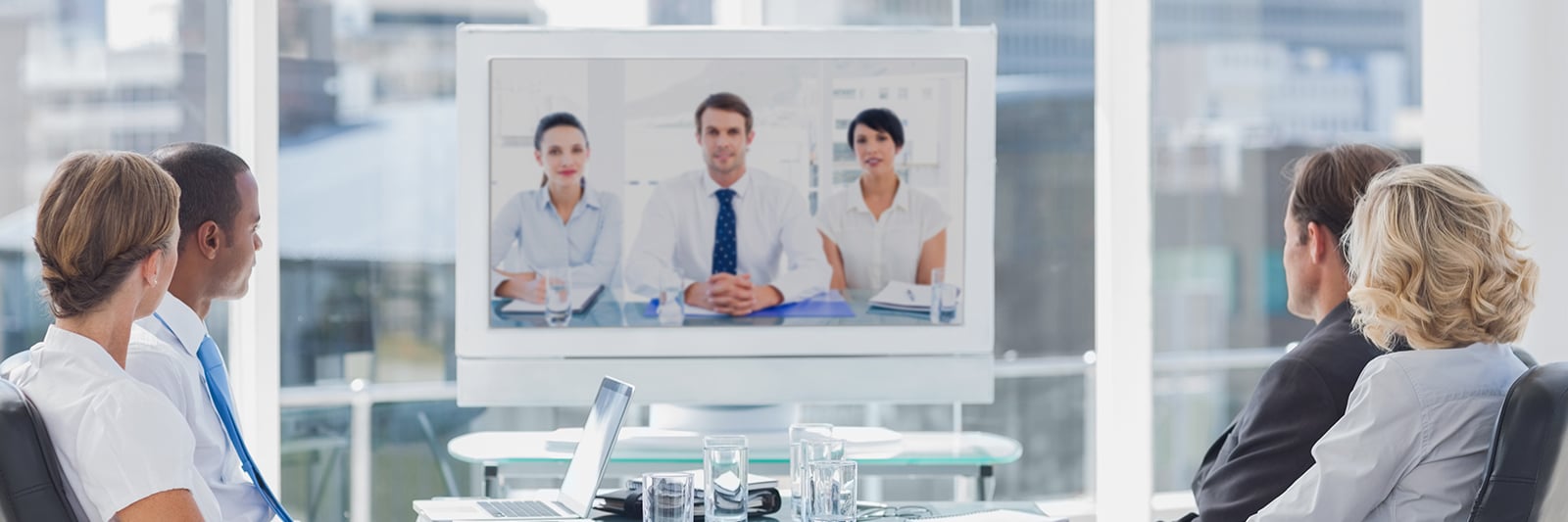 bigstock-Business-team-having-video-con-55903958