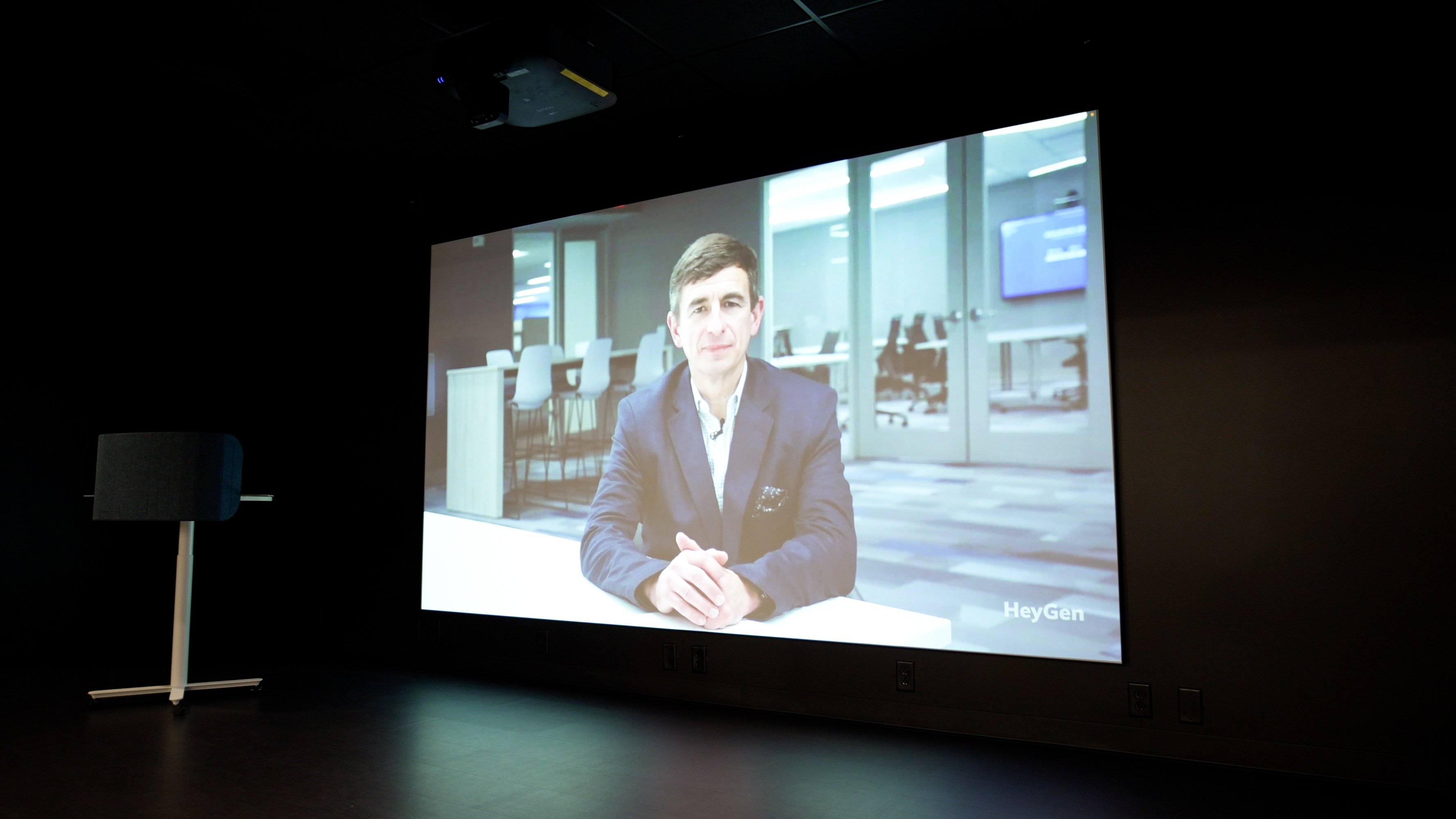 A large-format display transforms presentations with immersive video, capturing audience attention.