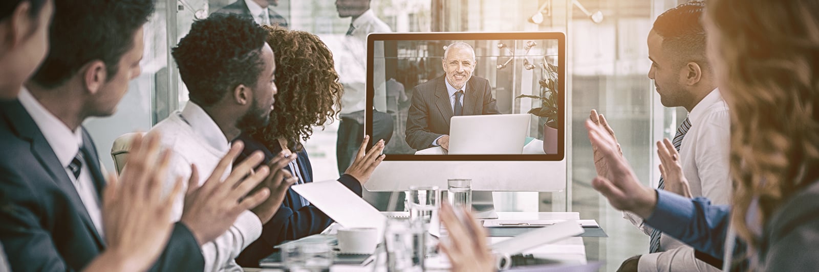 RP1Cloud boardroom waving to screen
