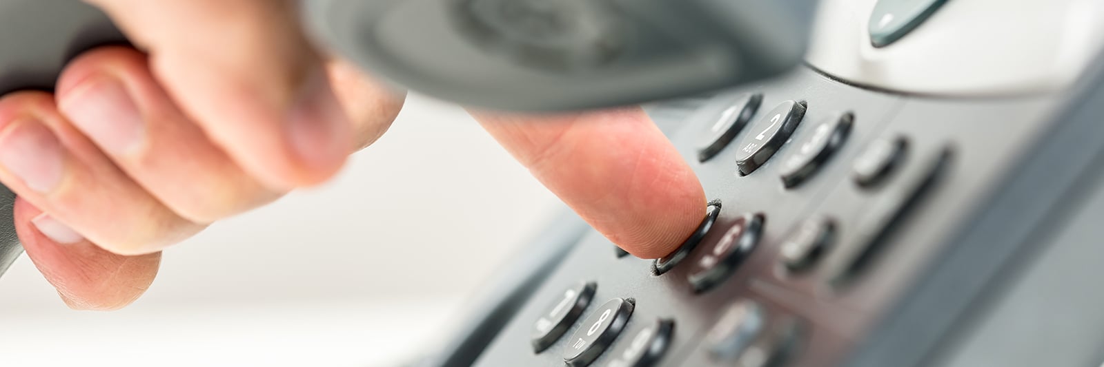 bigstock-Man-Dialling-Out-On-A-Telephon-68080879 _hero